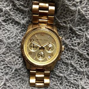 Gold Michael Kors women's wristwatch